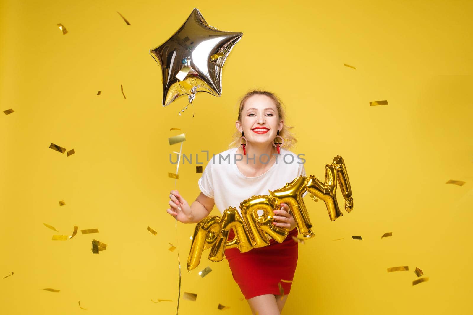 portrait of beautiful woman celebrating a party and having fun by StudioLucky