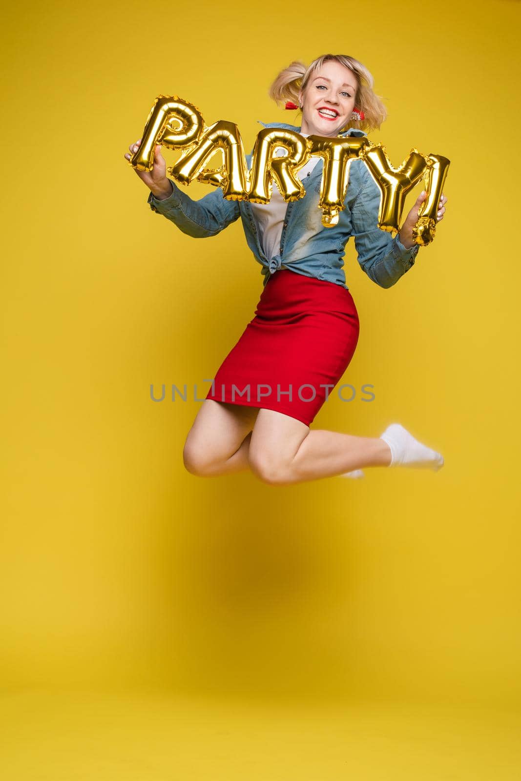 portrait of beautiful woman celebrating a party and having fun by StudioLucky