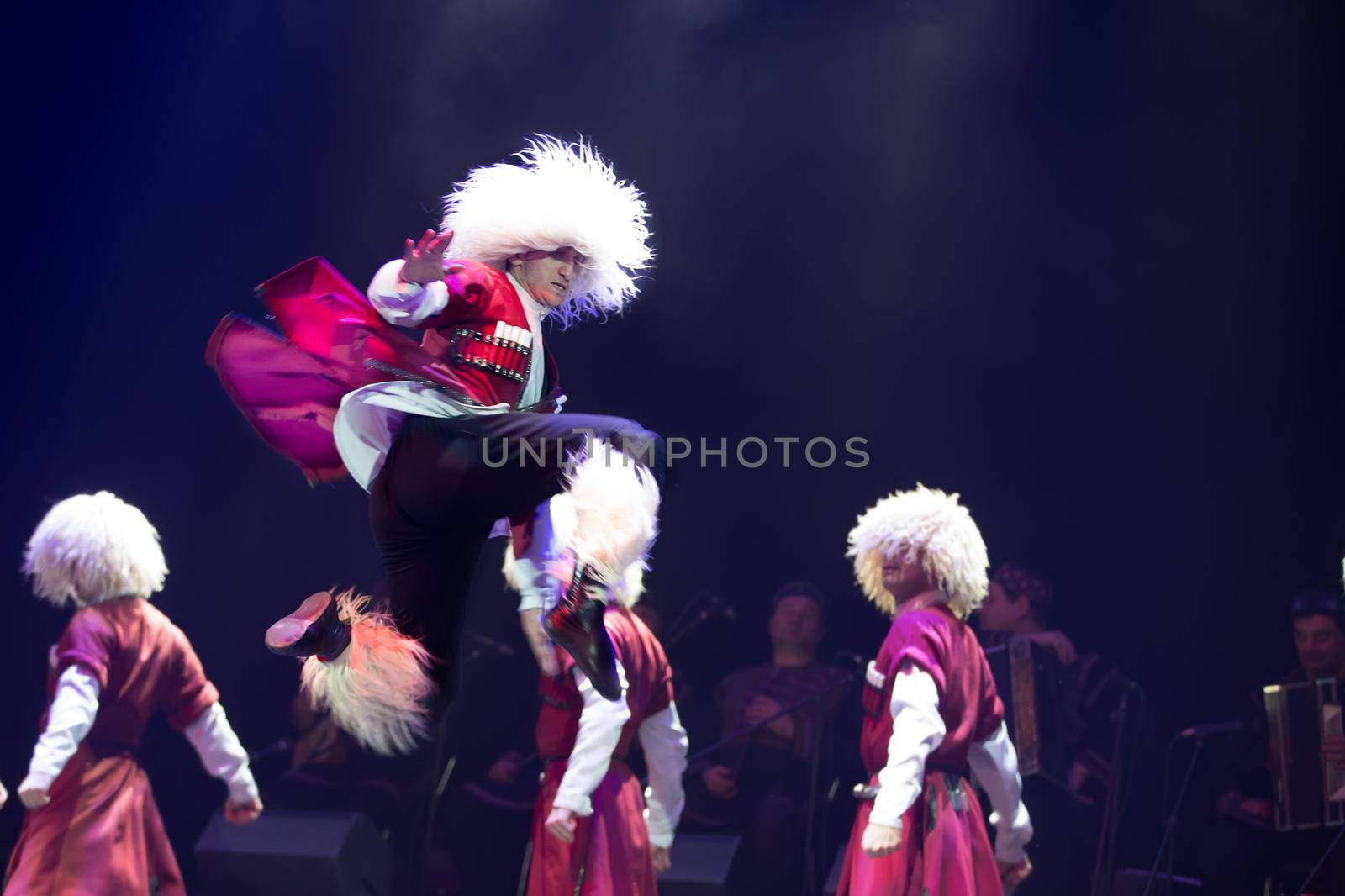 Belarus, Gomel, February 27, 2018. Concert hall. Speech of the national Georgian ballet Sukhishvili.Georgian dancer performs a jump on stage