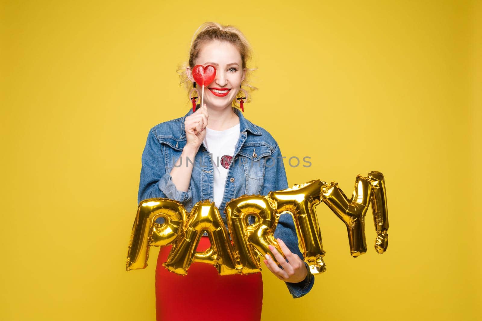 portrait of beautiful woman celebrating a party and having fun by StudioLucky