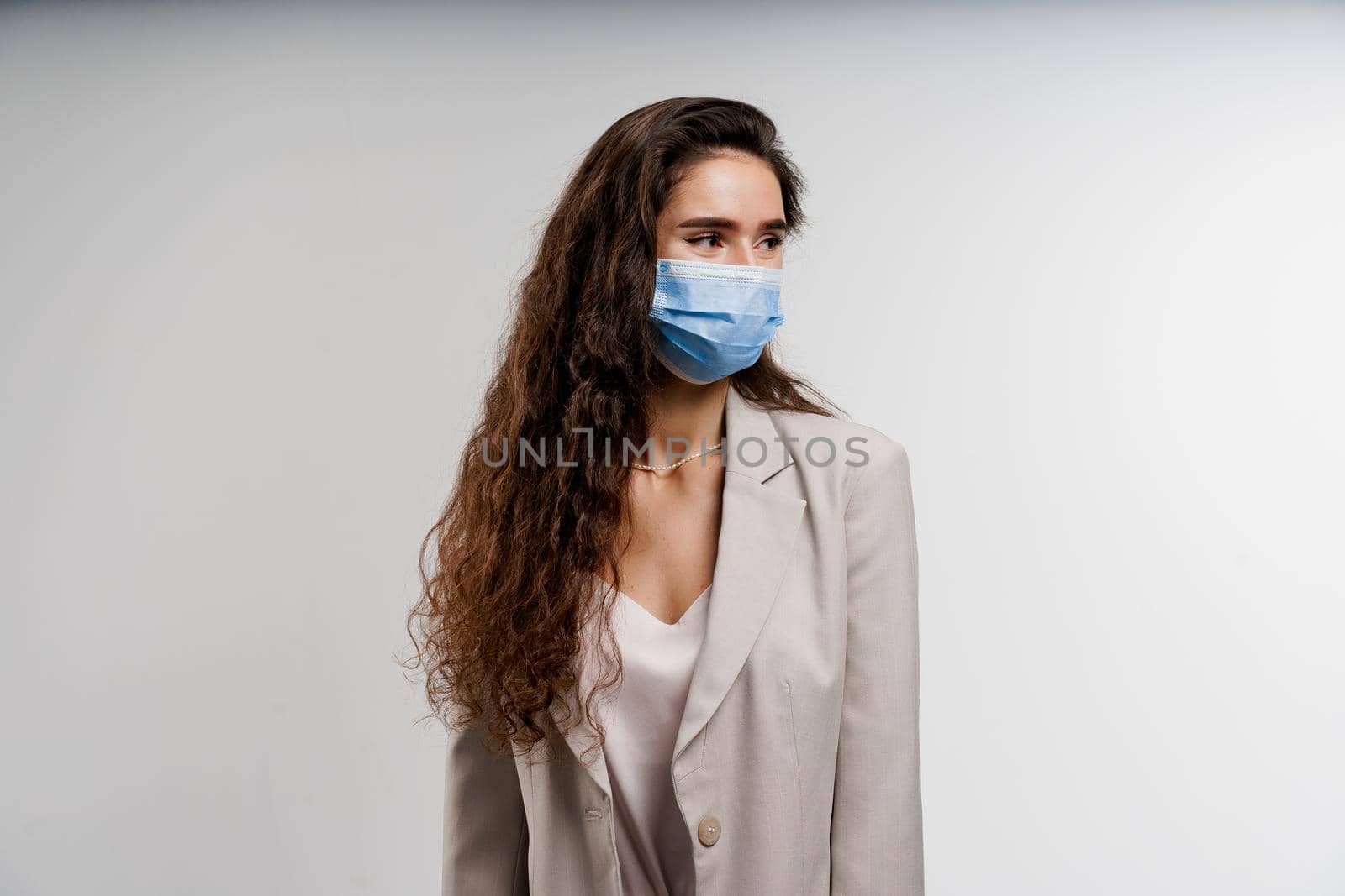 Girl in medical mask isolated on white background. Coronavirus covid-19 quarantine concept.
