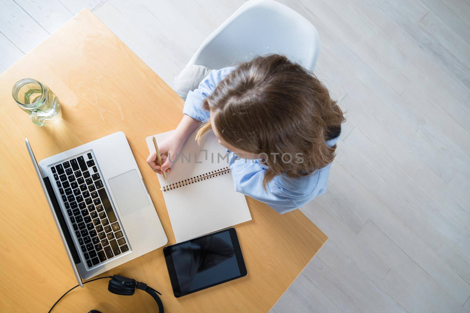 teenager is studying at home on carrantine. top view. High quality photo