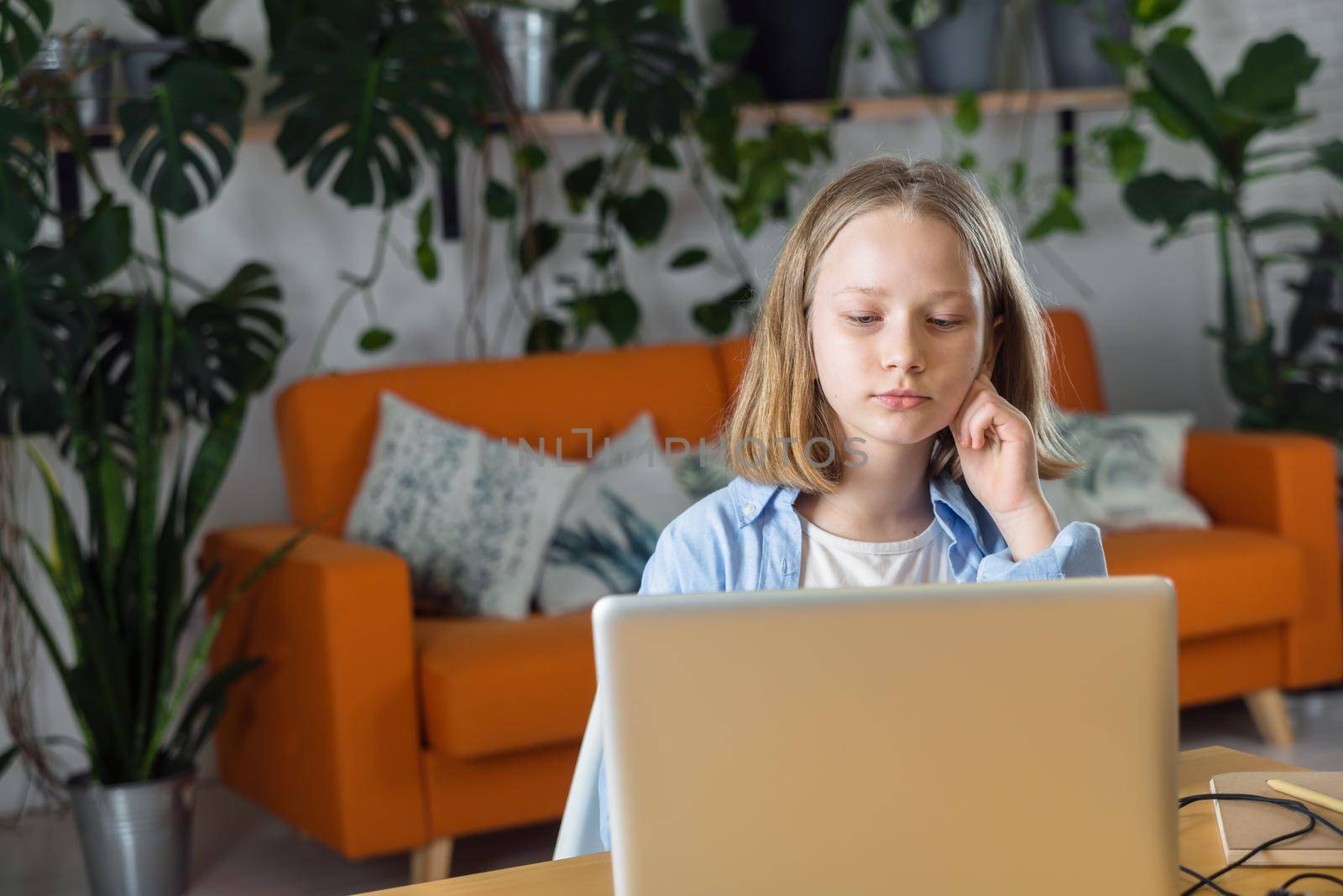 teenager is studying at home on carrantine. High quality photo