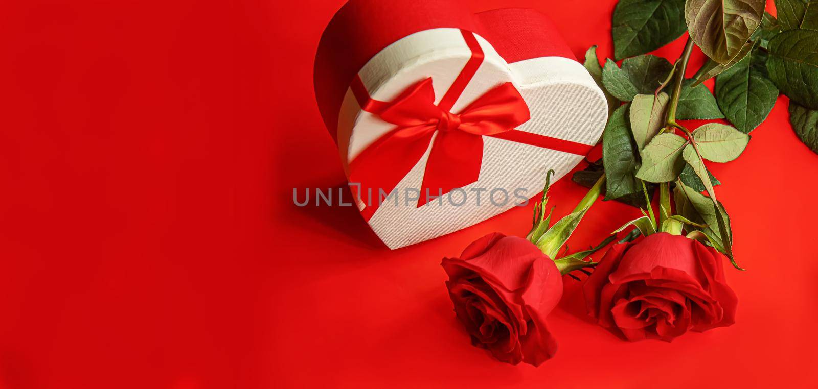 Gift box on a wooden background. Valentine's Day gift.selectiv focus by mila1784