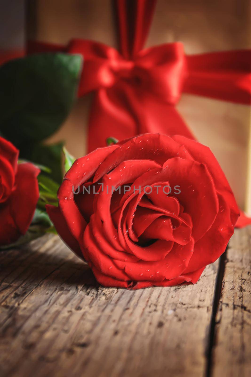 Gift box on a wooden background. Valentine's Day gift.selectiv focus.holiday