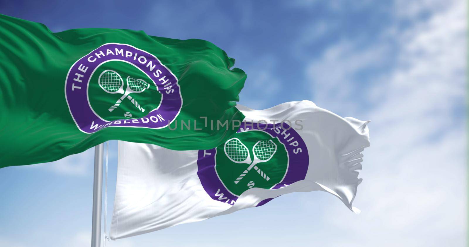 London, UK, April 2022: flags with the The Championships Wimbledon logo waving in the wind by rarrarorro