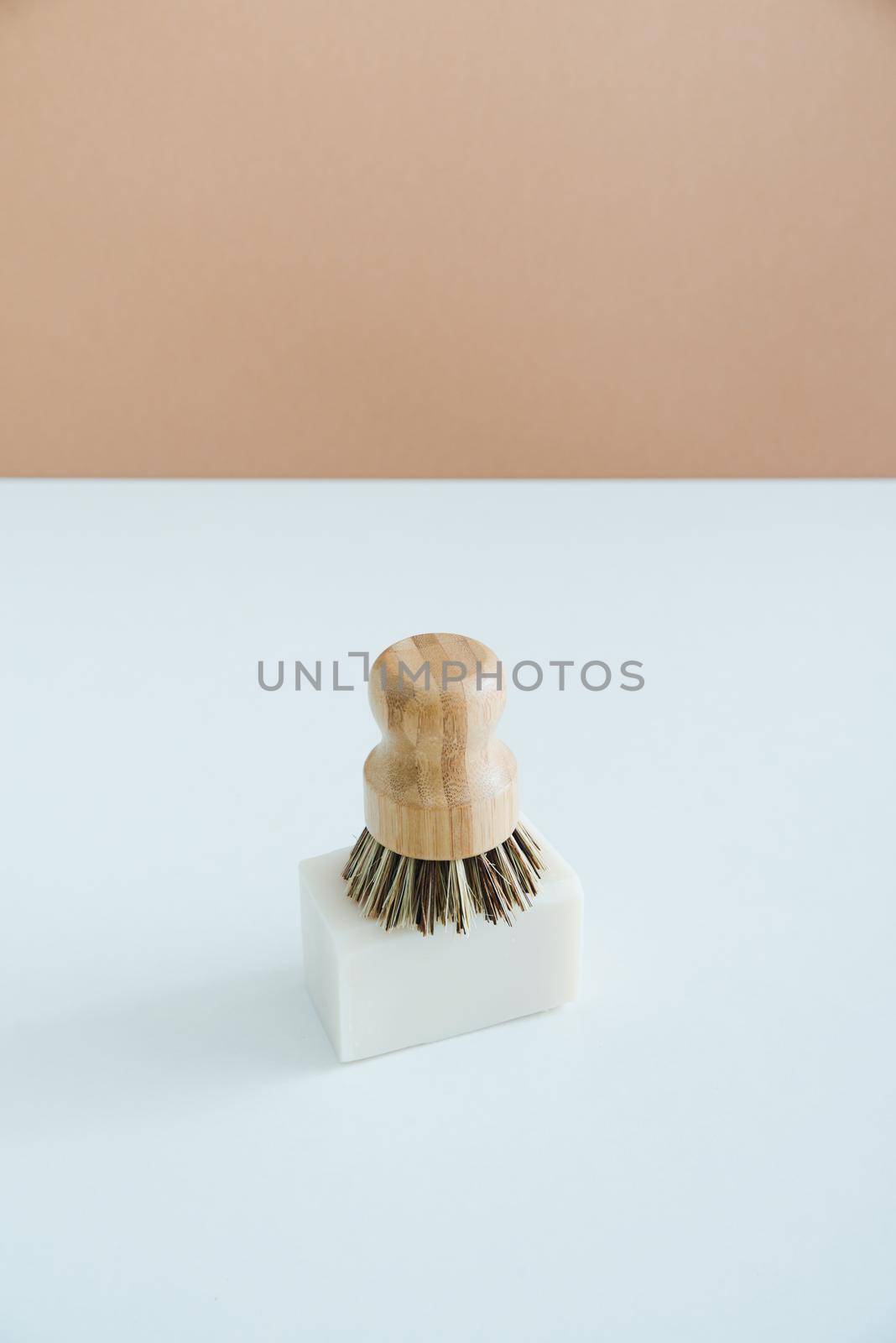 zero waste bamboo brush with soap for dishwashing in minimalistic style by maramorosz