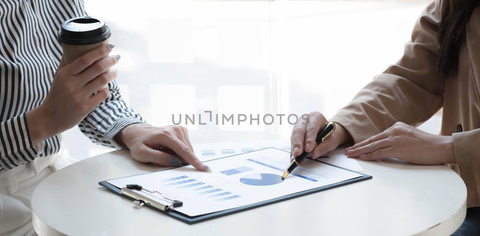 Team of business people working together in the meeting room office, teamwork background charts and graphs banner, double exposure successful teamwork,business planning concept. by wichayada