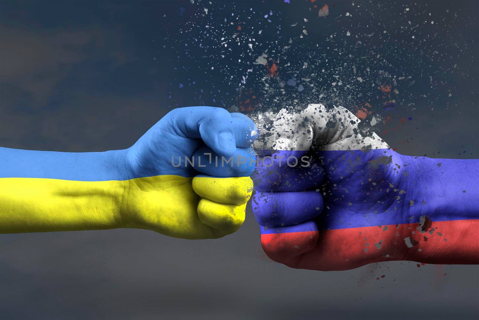 War between Ukraine and Russia. Ukraine's victory in the war. The concept of a military operation in ukraine, two fists painted in the colors of the flags hit each other.