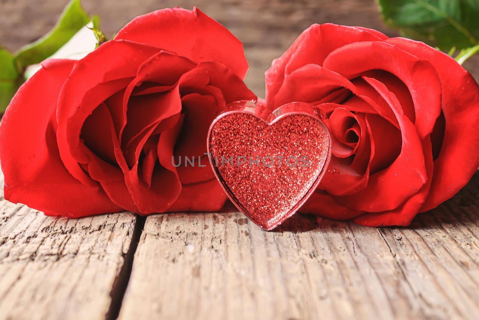 Gift box on a wooden background. Valentine's Day gift.selectiv focus by mila1784