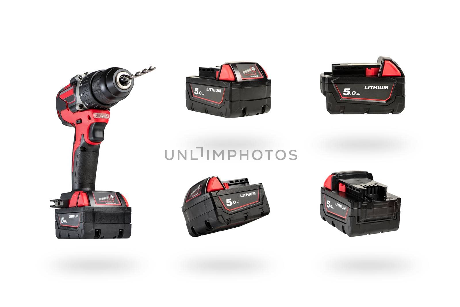 cordless tool isolated on white background. Cordless screwdriver with a drill inserted into the chuck and an extra battery on a white background