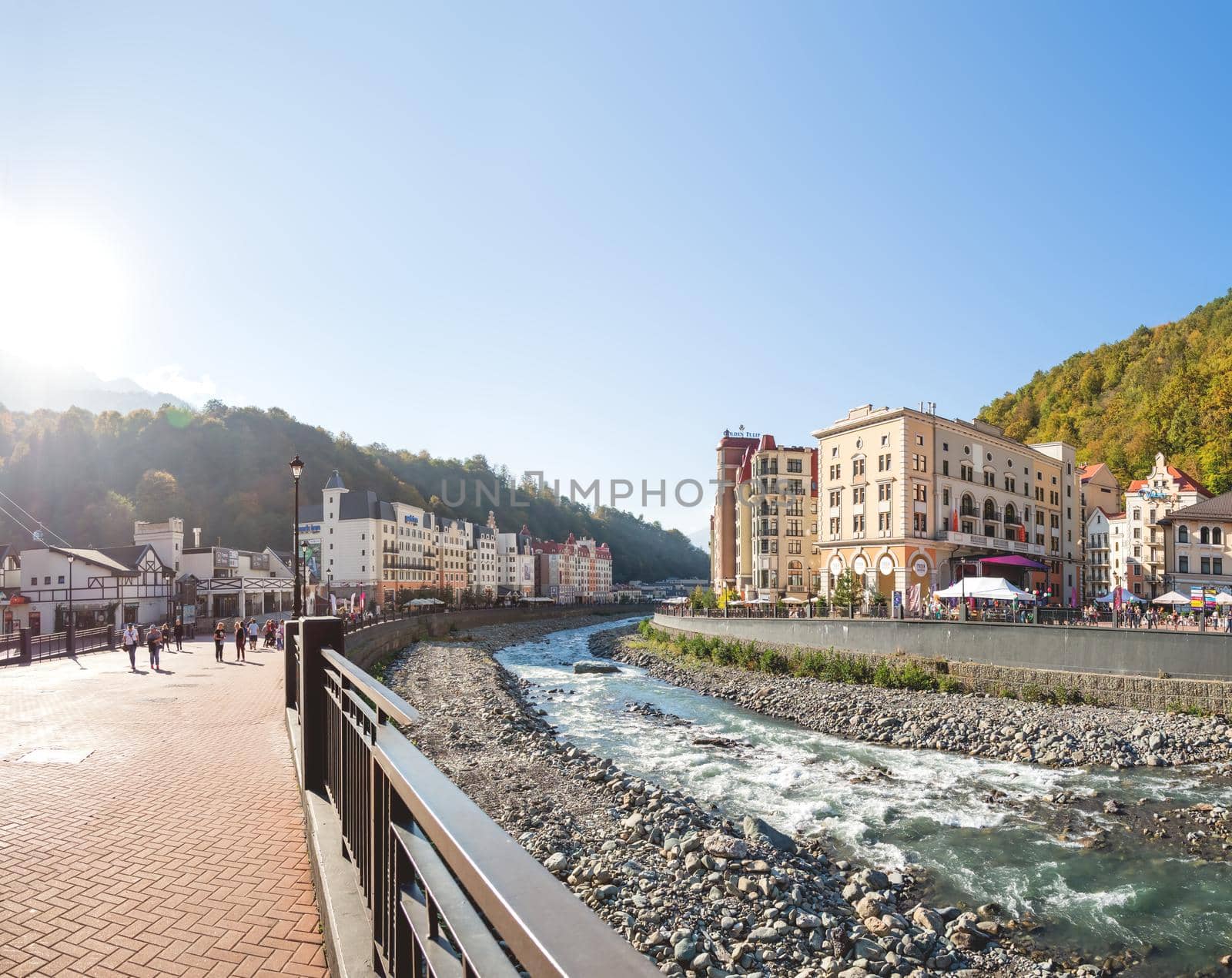 SOCHI, RUSSIA - October 13, 2018. Panorama view of Mzymta river embankment in Rosa Dolina. Famous Rosa Khutor Alpine Ski Resort near Sochi.