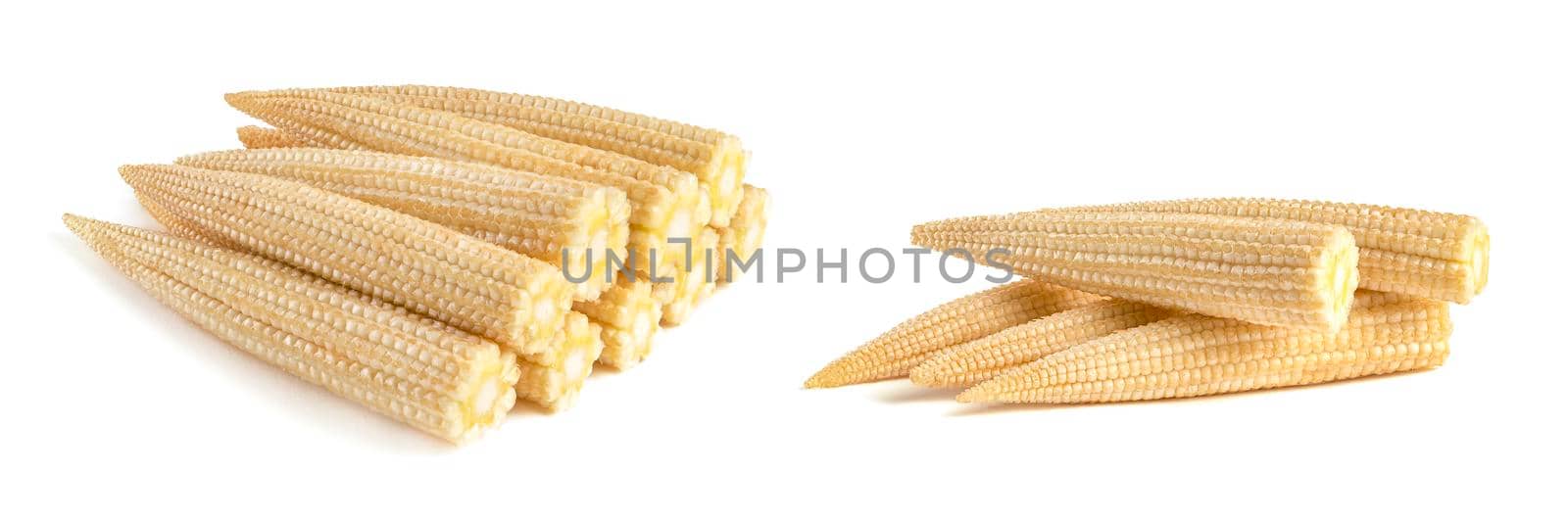 Set of stacks of corn on a white background. Baby corn isolated on white uniform background, clipping path, full depth of field. by SERSOL