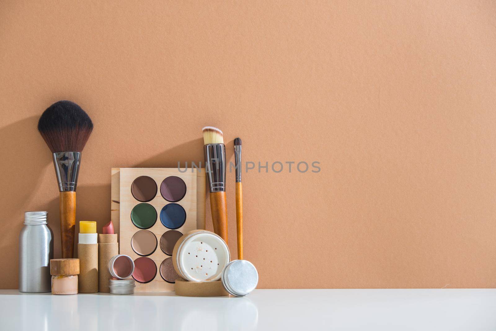 zero waste make up set in minimalistic style on pastel background by maramorosz