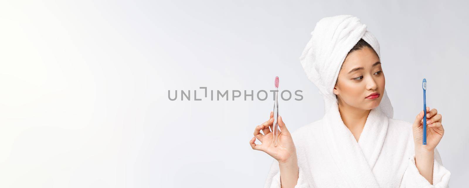 Close up of Smile woman brush teeth. great for health dental care concept, Isolated over white background. asian. by Benzoix