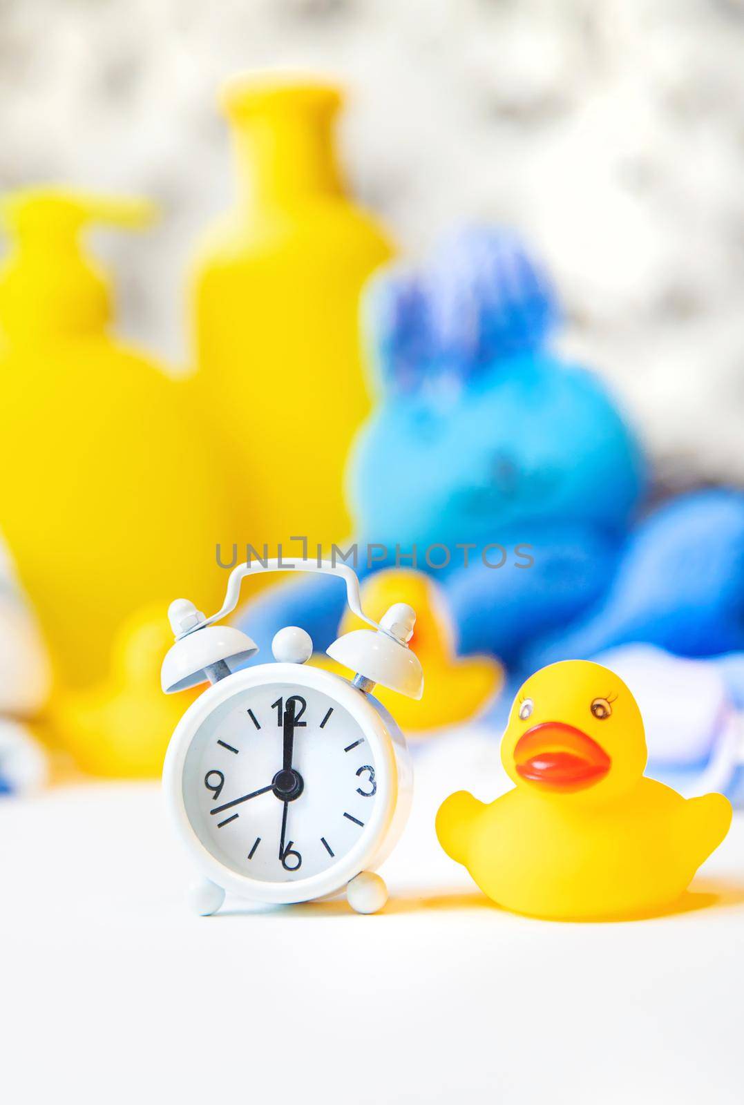 Baby bathing accessories on a white background. Selective focus. by mila1784