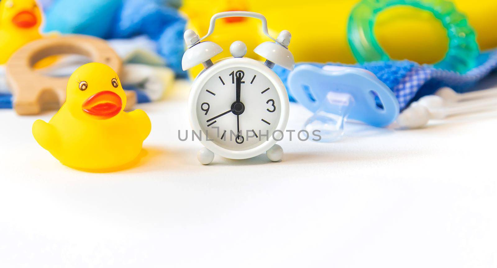 Baby bathing accessories on a white background. Selective focus. by mila1784
