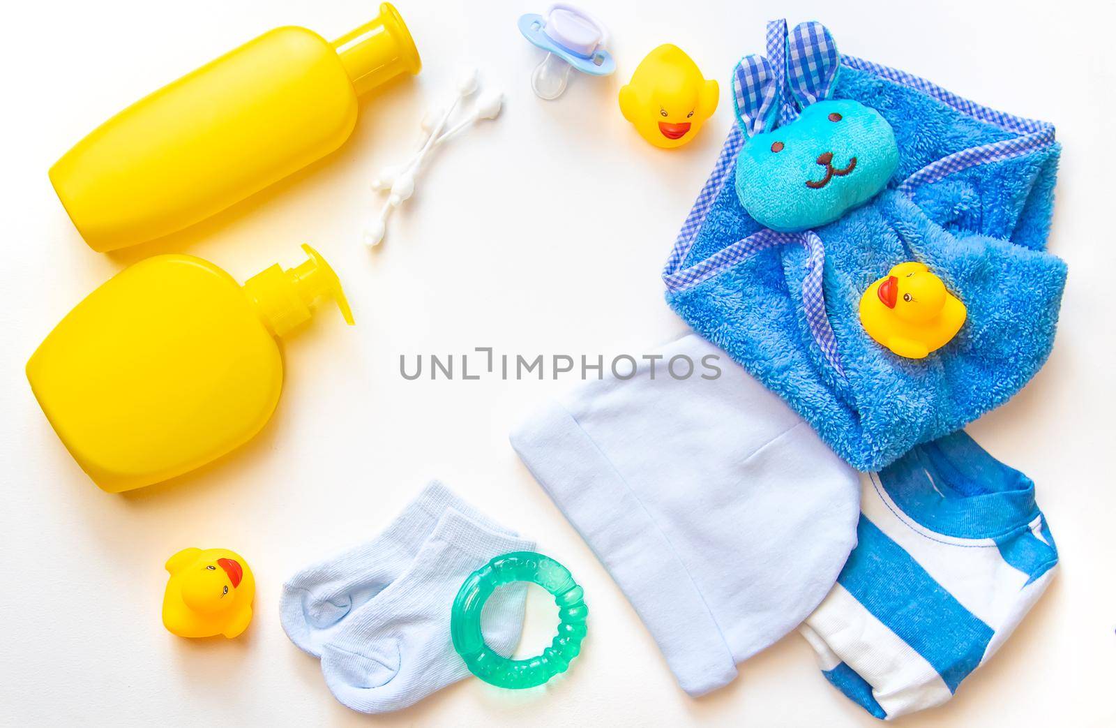Baby bathing accessories on a white background. Selective focus.