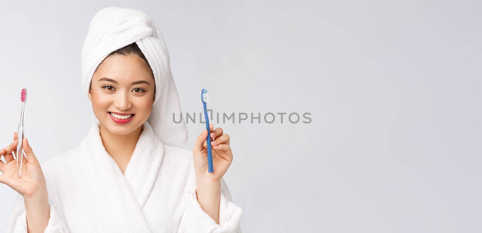 Close up of Smile woman brush teeth. great for health dental care concept, Isolated over white background. asian