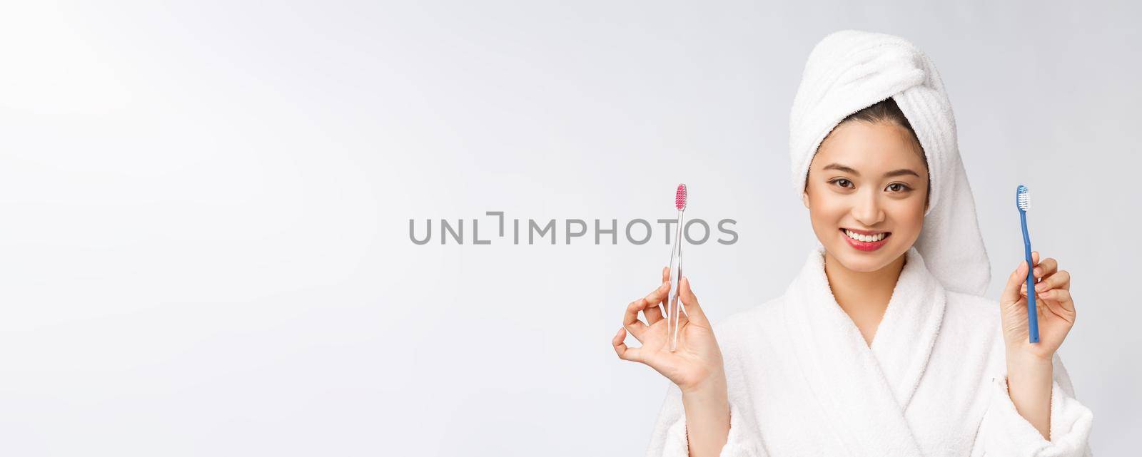 Close up of Smile woman brush teeth. great for health dental care concept, Isolated over white background. asian