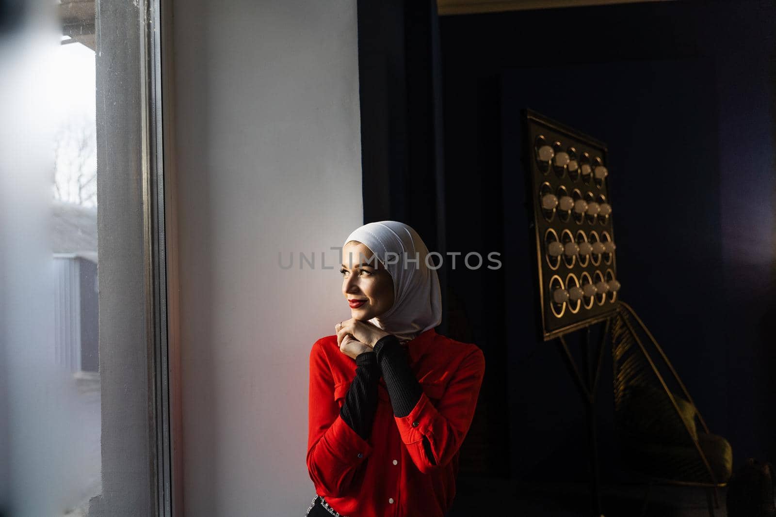 Portrait of muslim woman weared in traditional islamic scarf. Islam religion. by Rabizo