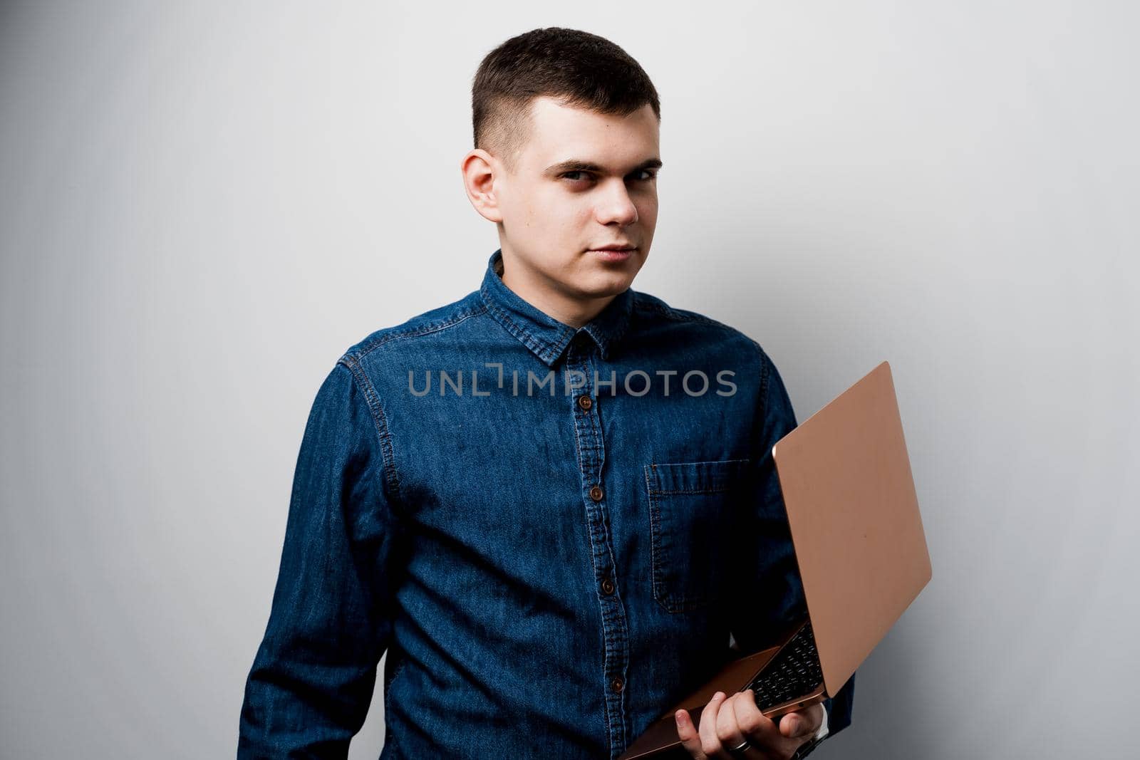 SMM specialist with laptop on white background. Advert for business in social media.