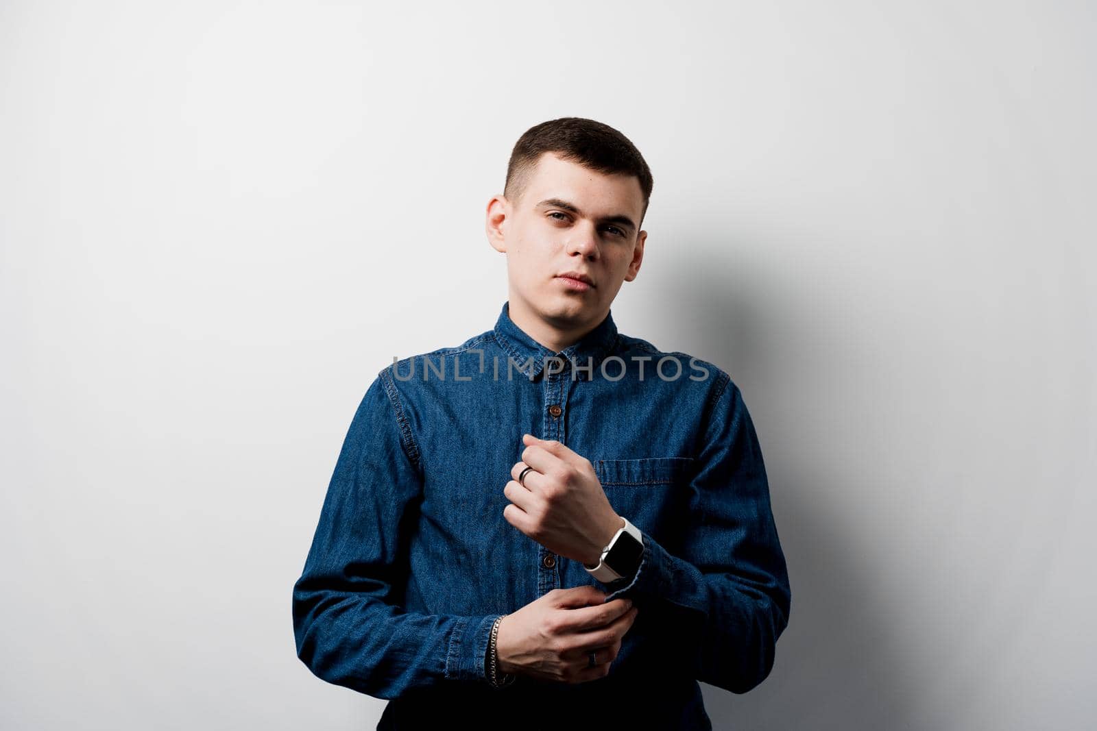 Confident business man on white background. Working on-line at home.