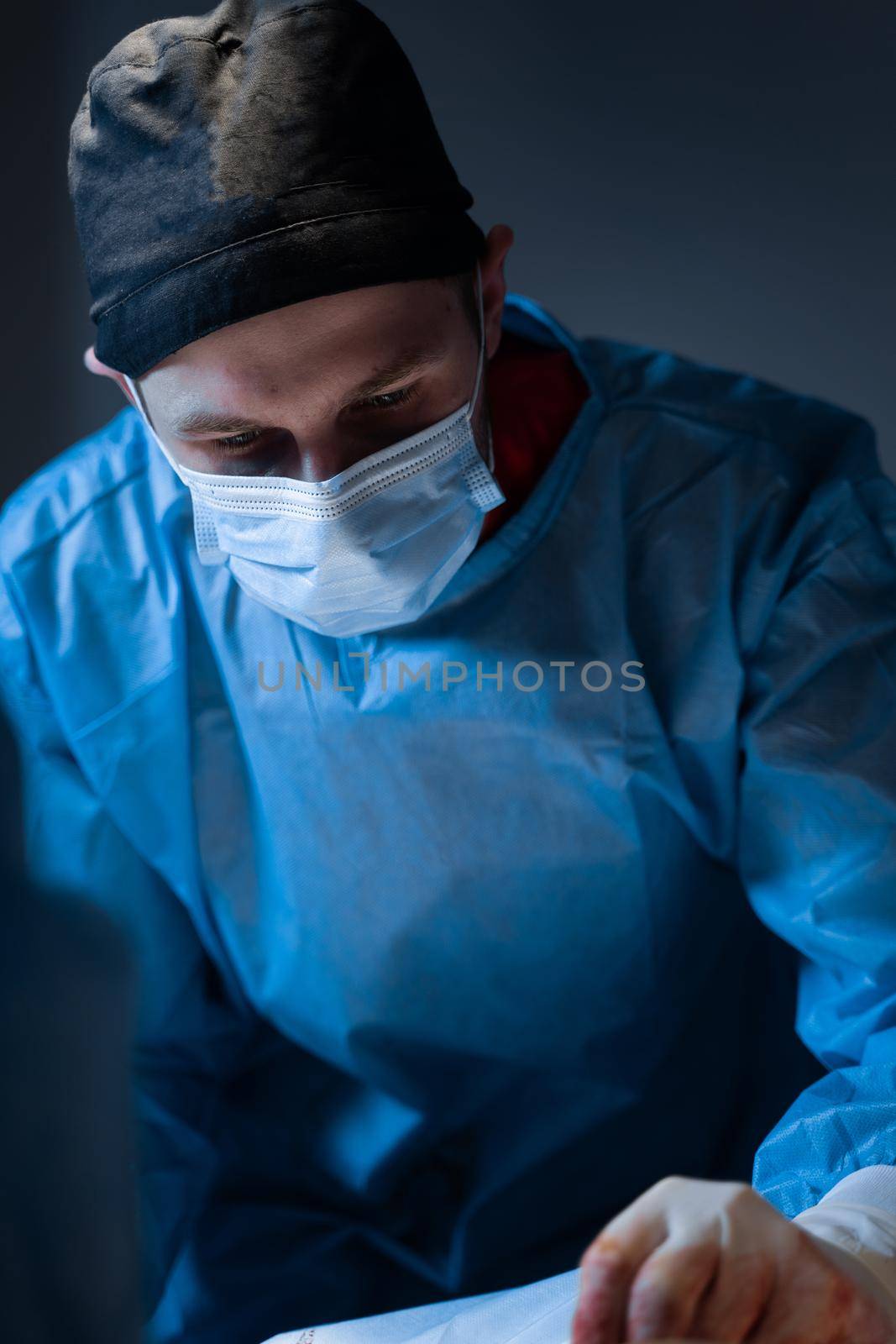 Vascular surgeon removing veins from the leg