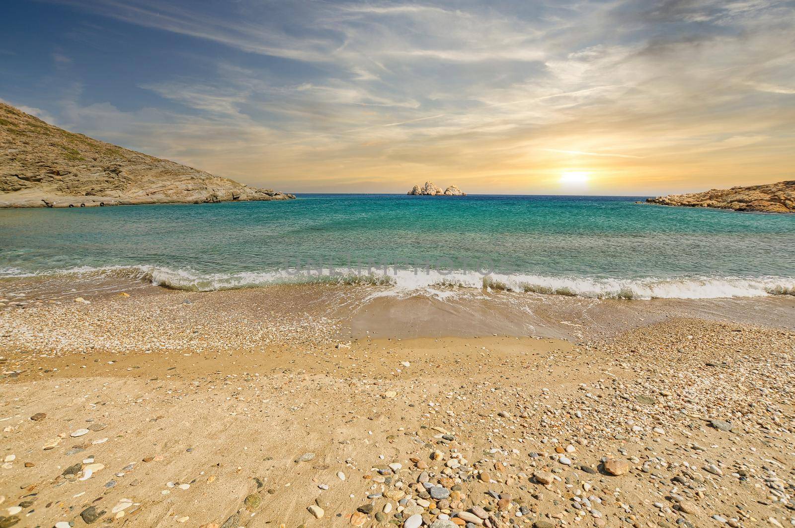 Beautiful beach of Agios Georgios in Sikinos Island with golden sand, Cyclades, Greece..