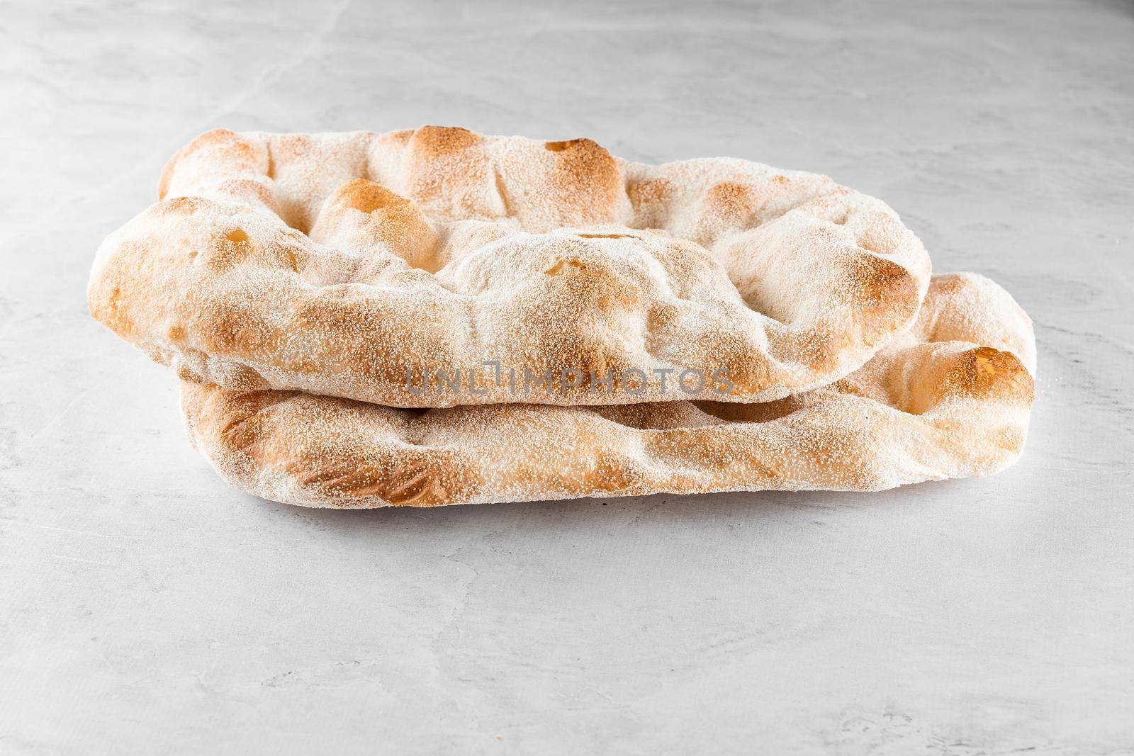 Dough for pinsa romana on light background. Gourmet italian cuisine. by Rabizo