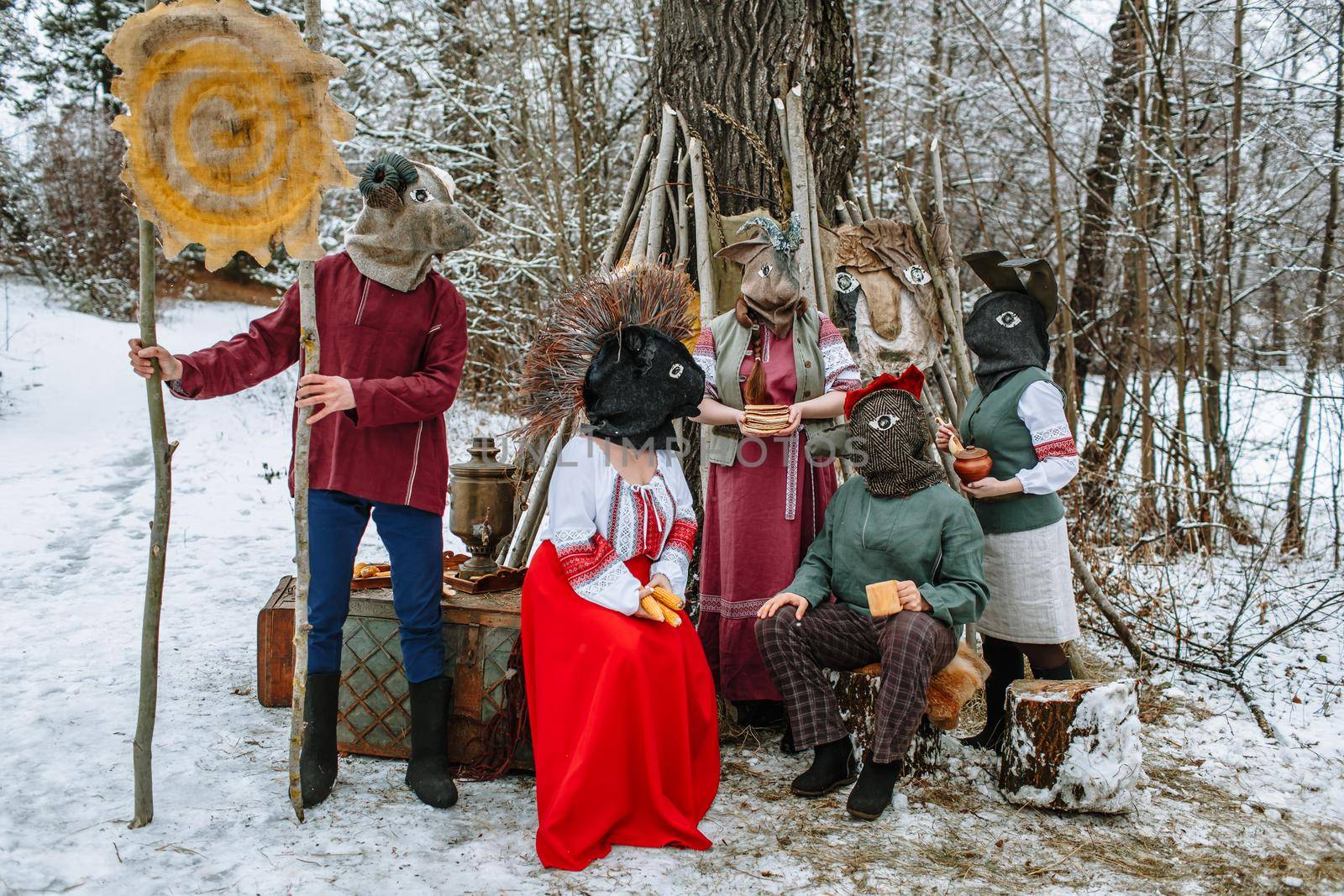 People in national costumes with animal heads celebrate the arrival of the pagan holiday Maslenitsa.