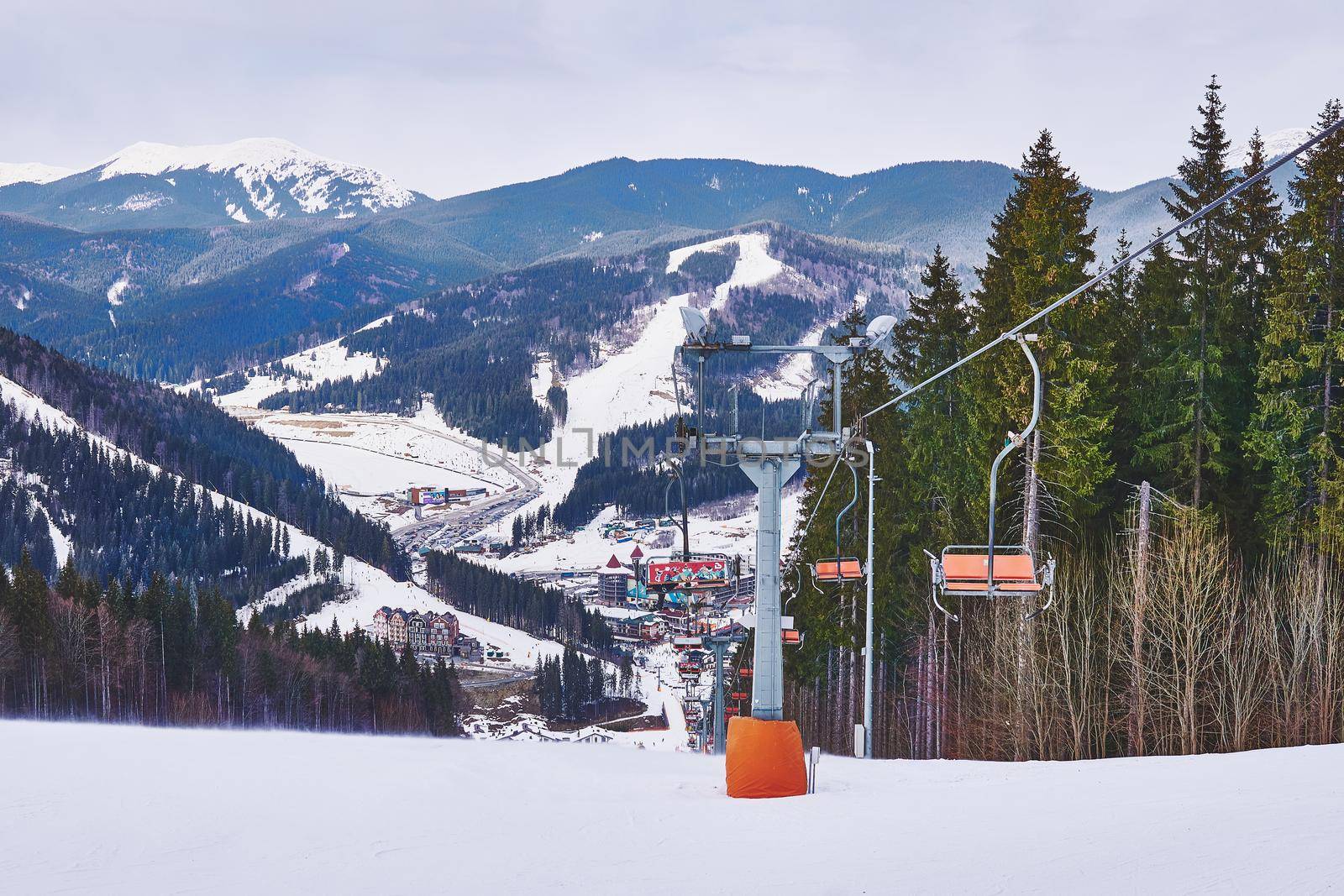 Cable car in the mountains at a ski resort in the mountains by jovani68