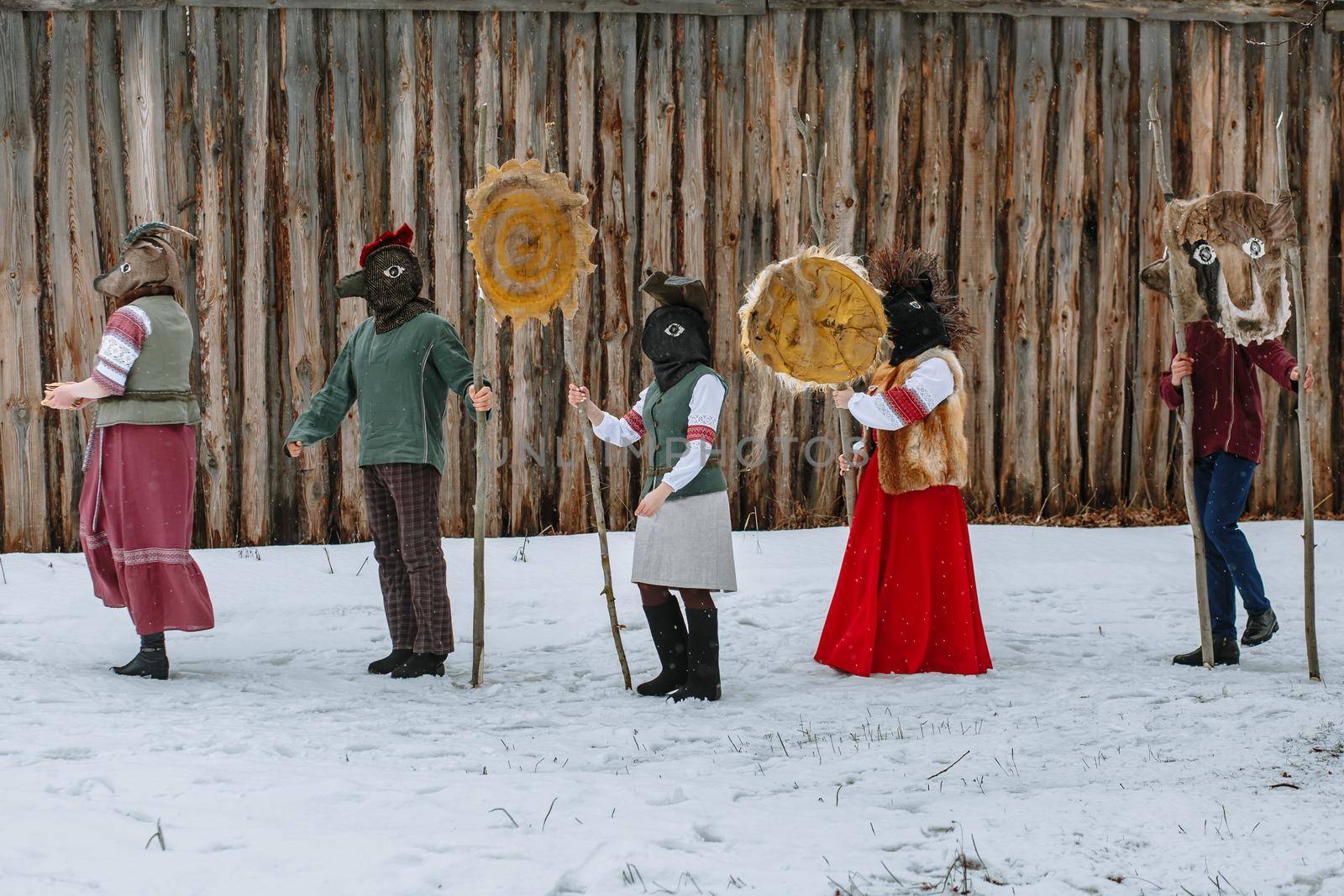 People in national costumes with animal heads celebrate the arrival of the pagan holiday Maslenitsa.