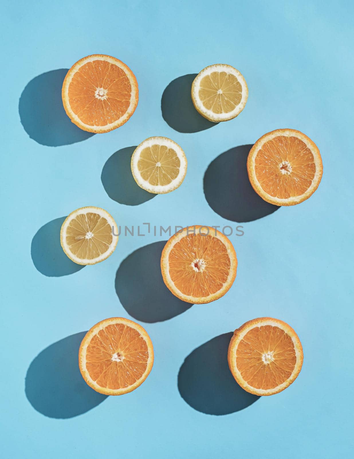 Pattern summer fruits orange and lemon fresh and sunny color. Minimal trend concept.