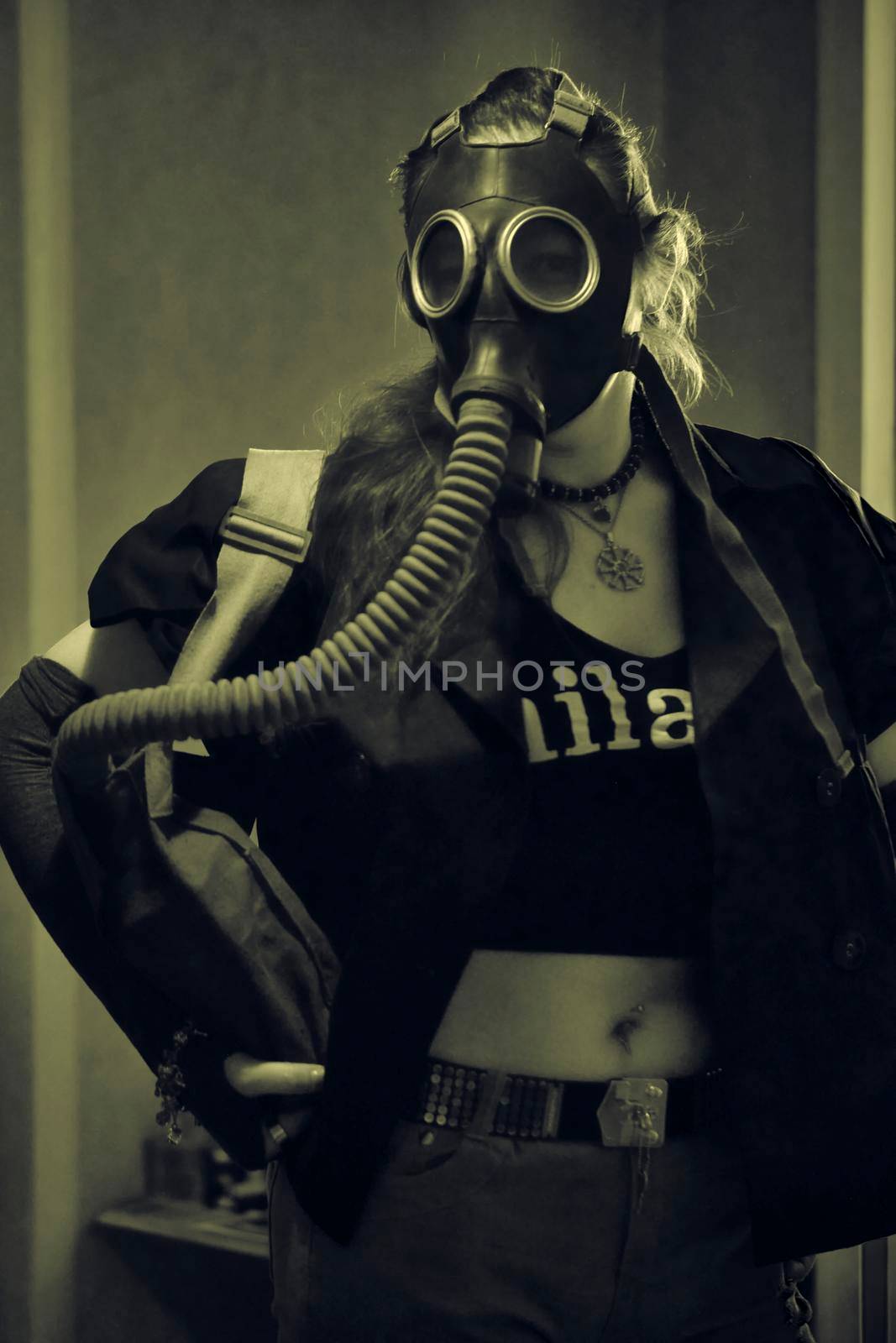 girl in a gas mask with a hose sepia by lempro