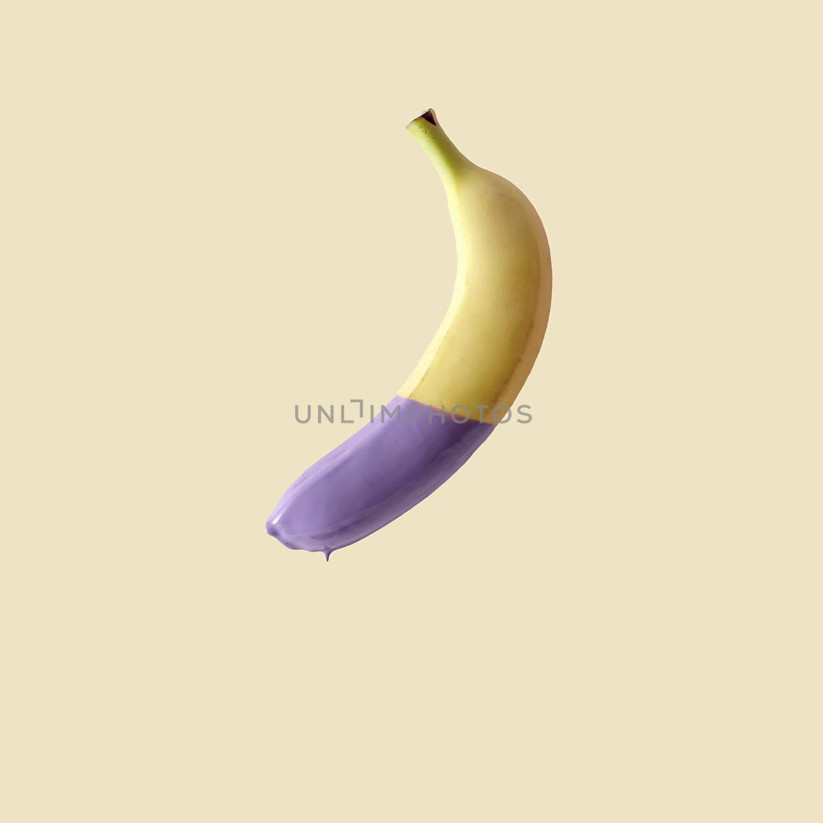 Banana in paint on a yellow background. by sergii_gnatiuk