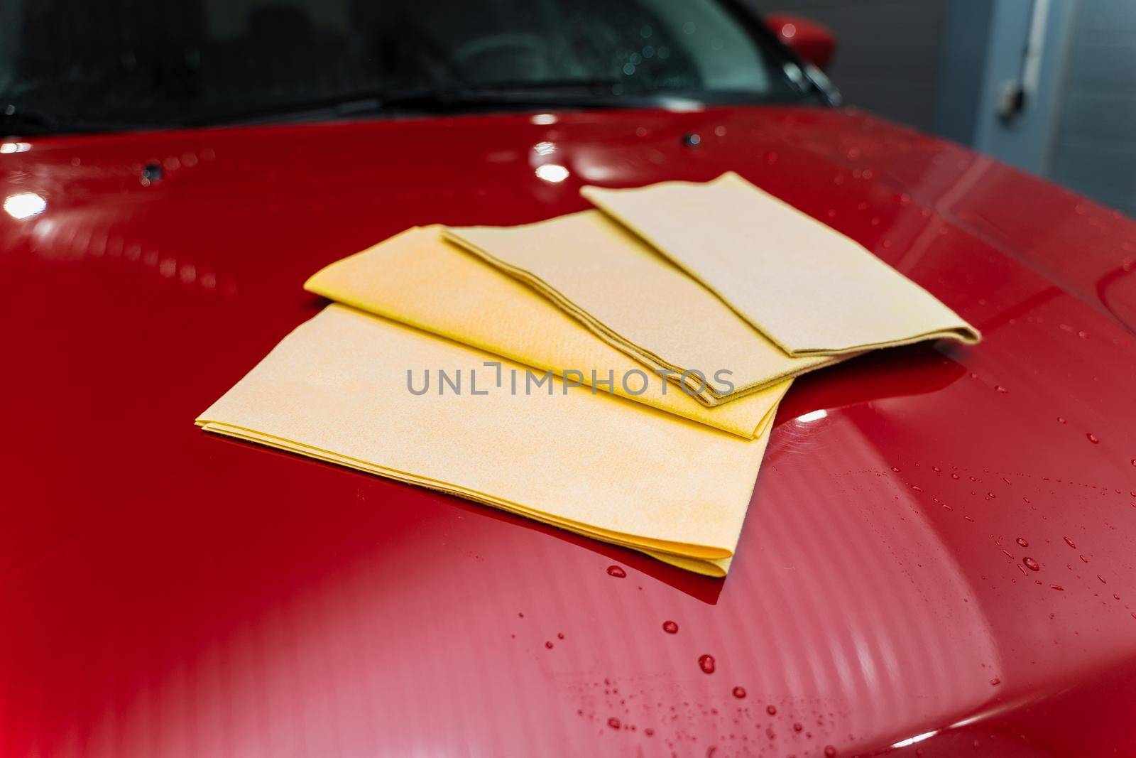 microfiber assortment cloths on the hood of the car by Rabizo
