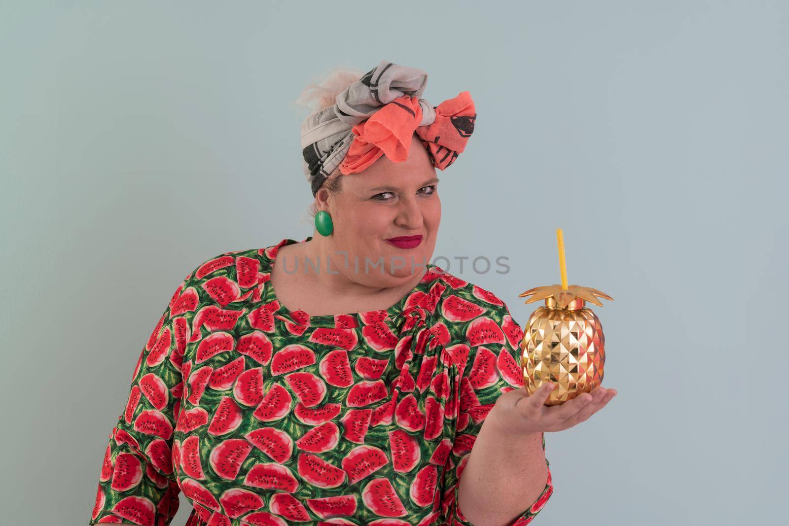 Overweight plus size female, fat women, Fat girl, Chubby, holding golden fruit ananas isolated on cyan background - lifestyle Woman diet weight loss overweight problem concept. High quality photo