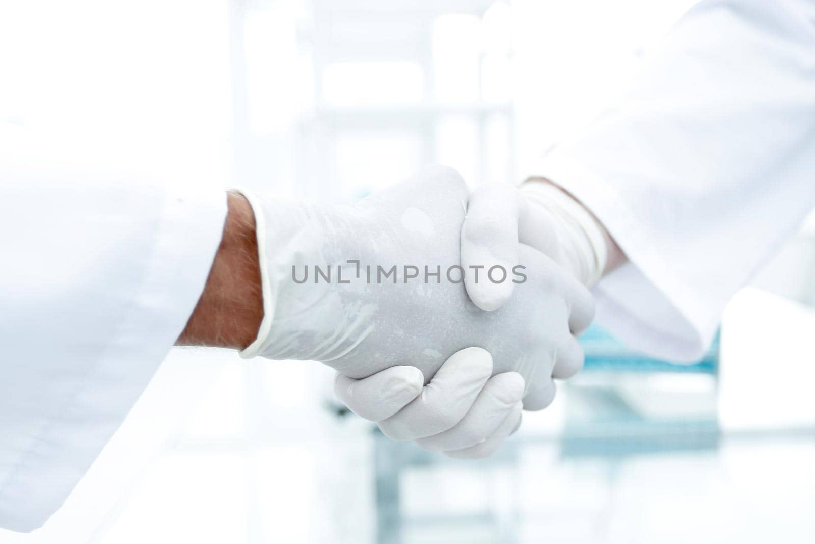 handshake of doctor in laboratory