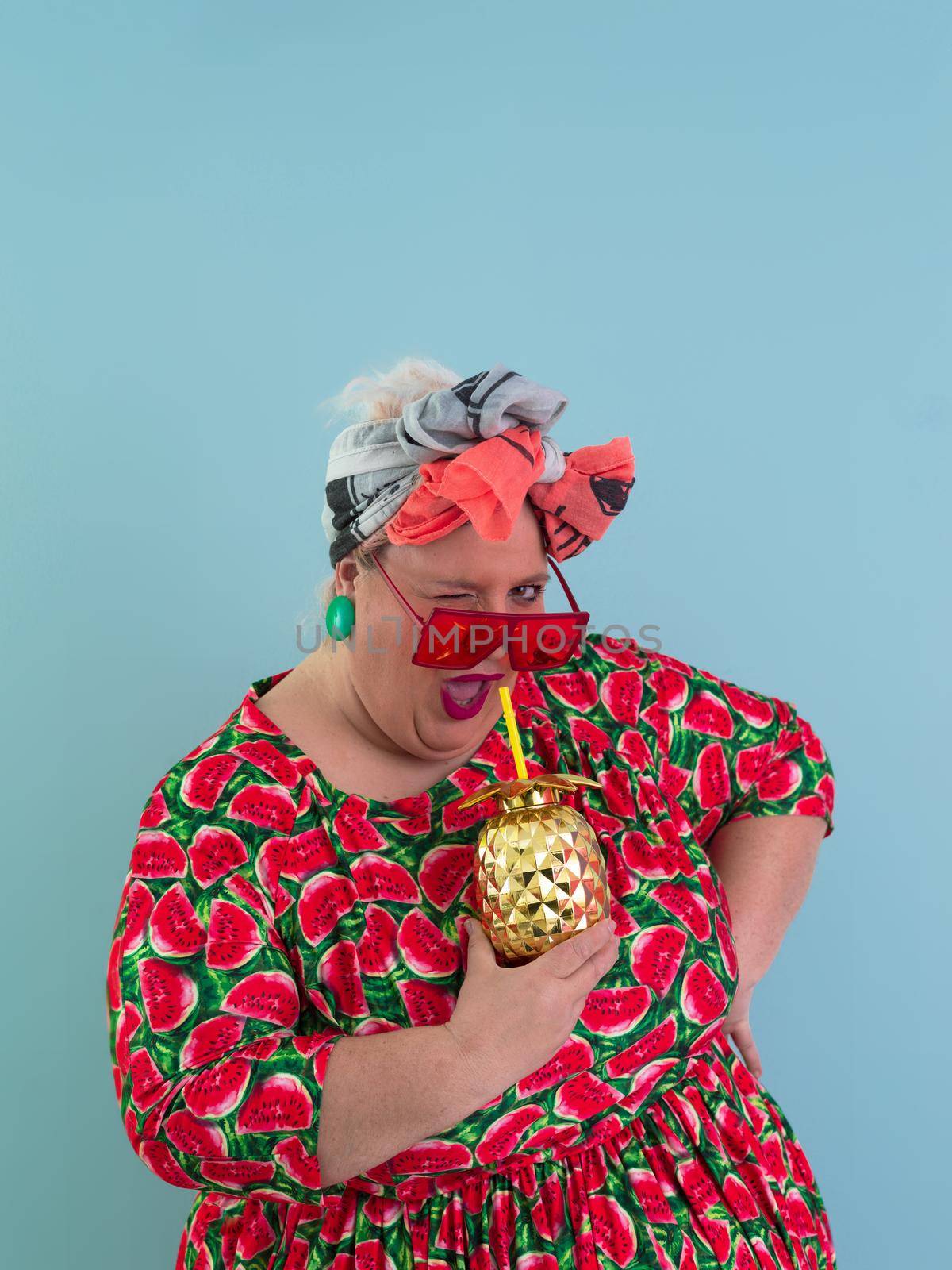 Overweight plus size female, fat women, Fat girl, Chubby, holding golden fruit ananas isolated on cyan background - lifestyle Woman diet weight loss overweight problem concept. by dotshock