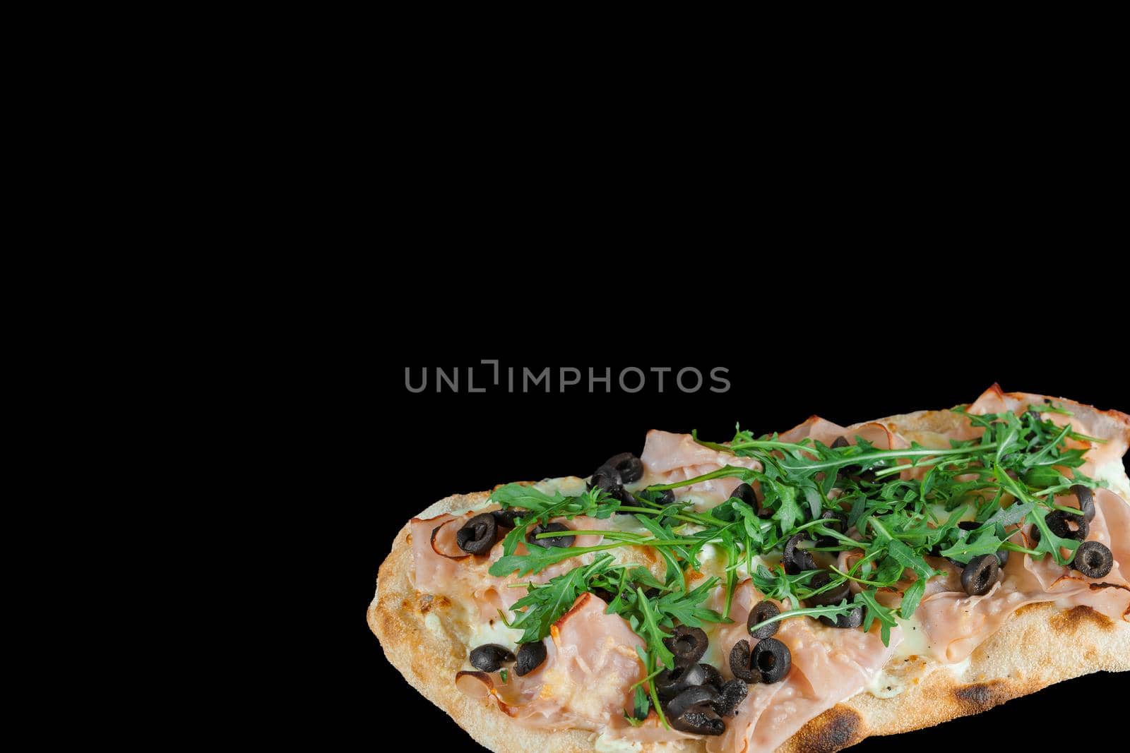 Pinsa romana gourmet italian cuisine on black background. Scrocchiarella traditional dish. Food delivery. by Rabizo