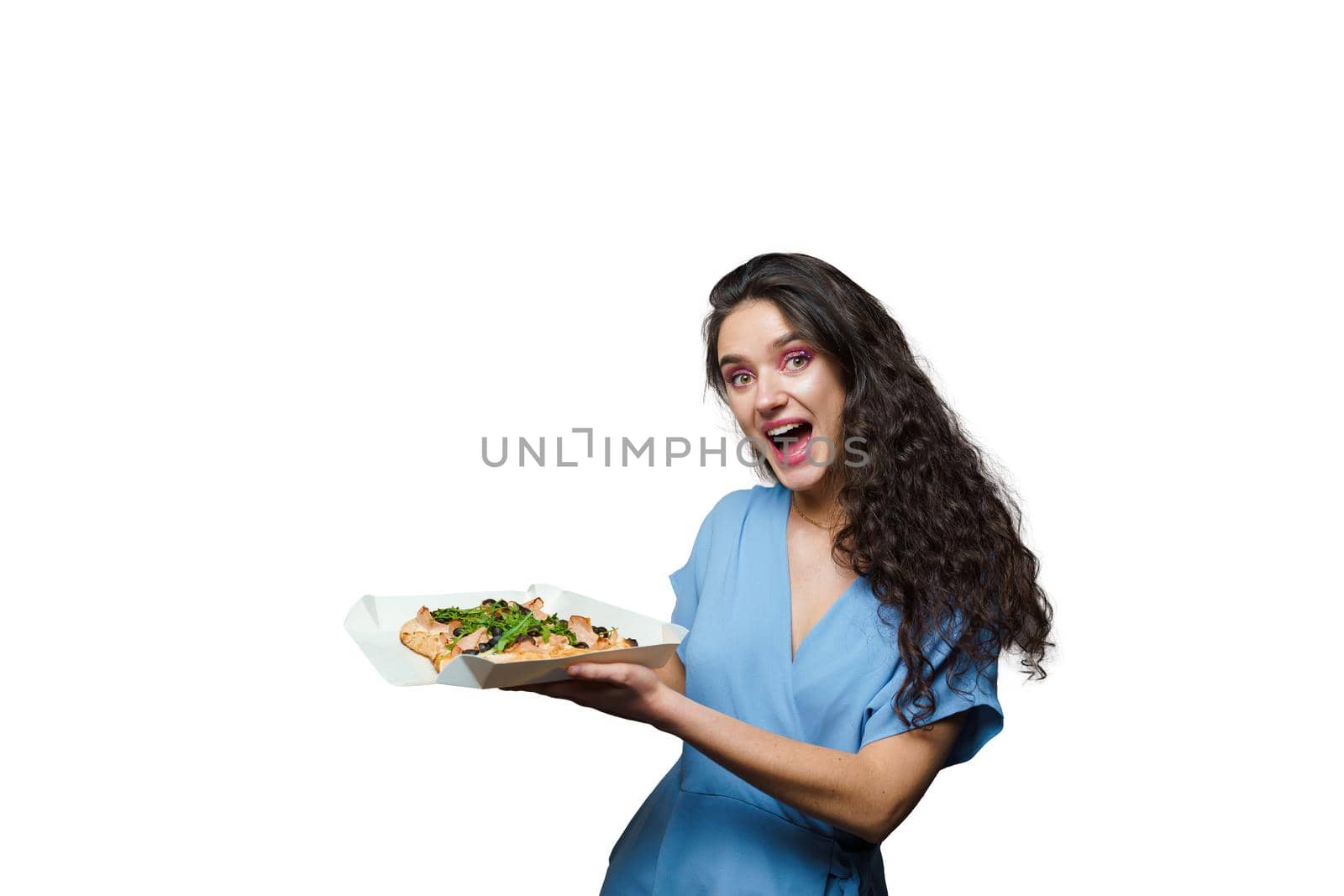 Girl courier with pinsa romana and scrocchiarella gourmet italian cuisine on white background. Holding traditional dish. Food delivery from pizzeria. Pinsa with meat, arugula, olives, cheese