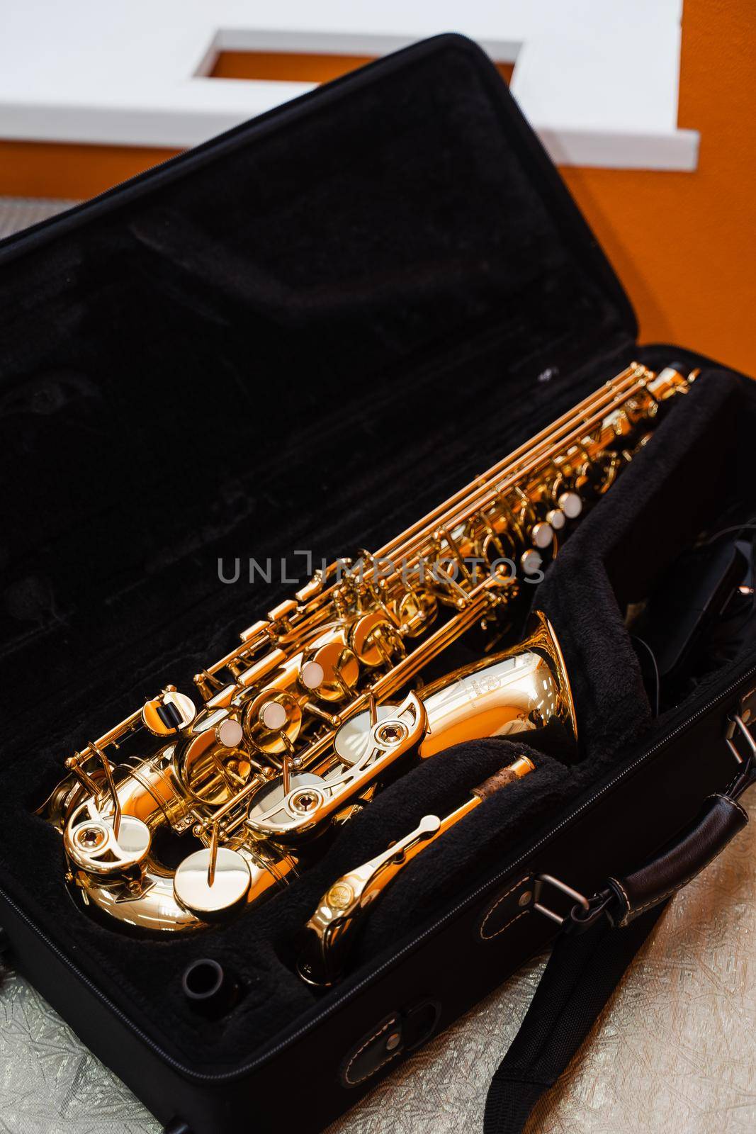 Saxophone musician instrument in case. Sax musical instrument for play jazz. by Rabizo