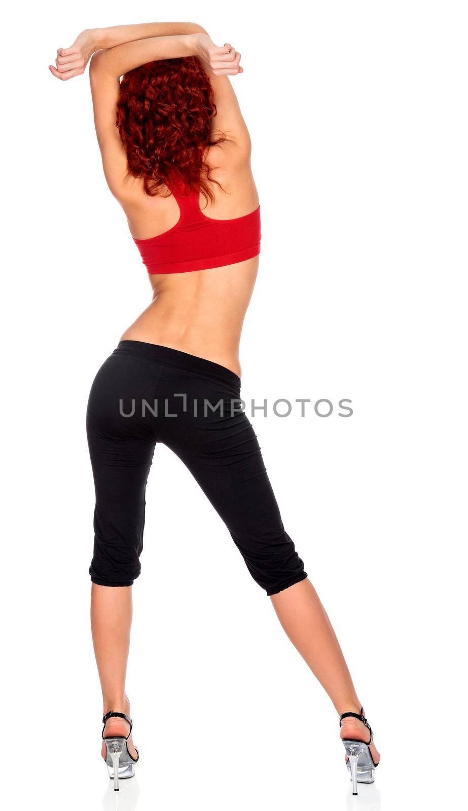 Sexy sporty woman, isolated on a white background