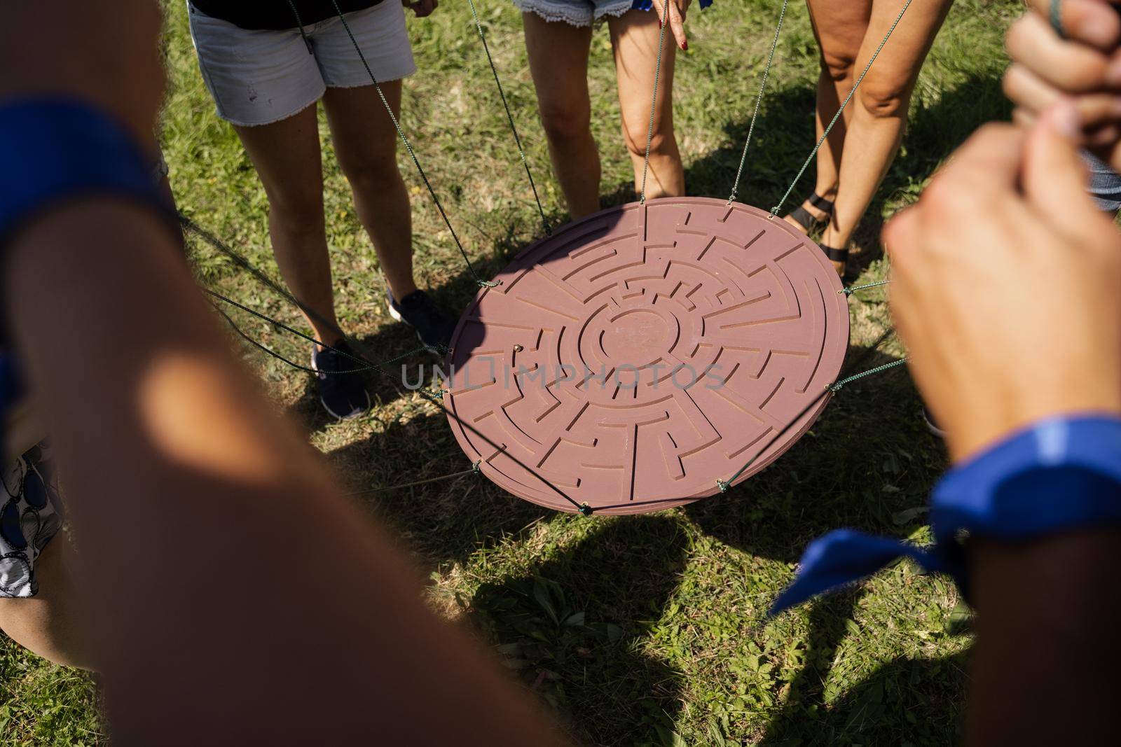 Teambuilding game for group of people for getting team spirit and increase friendship for colleagues. Labyrinth game for group of people.