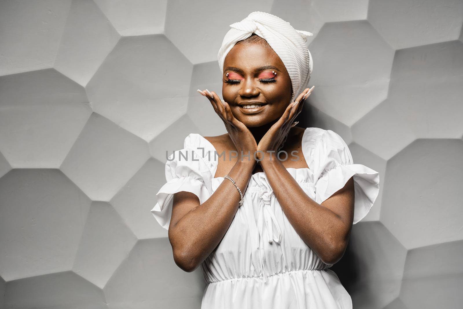 Beauty portrait of black attractive muslim model. Relaxing and meditation