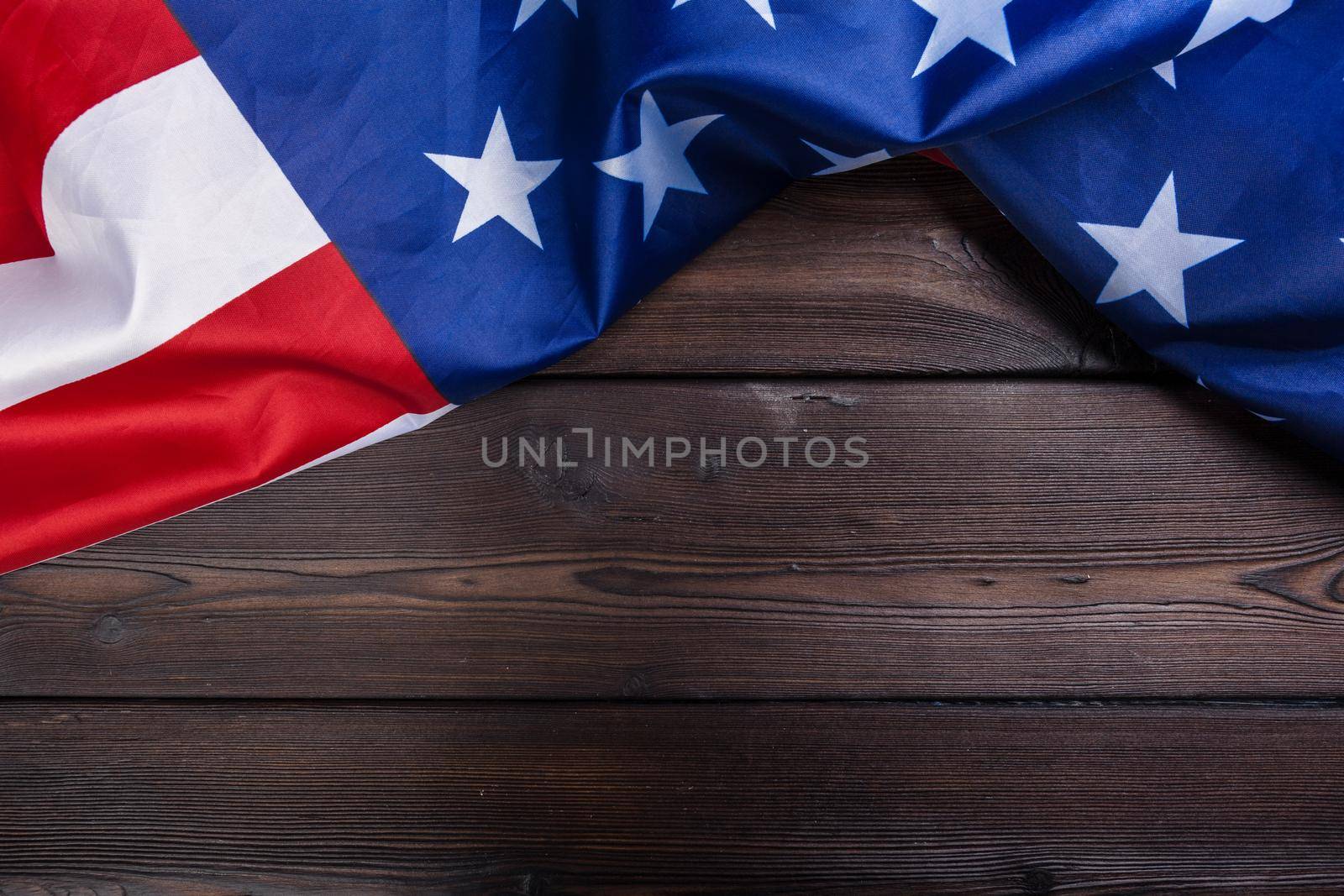 USA flag on dark wooden table background. creative photo.