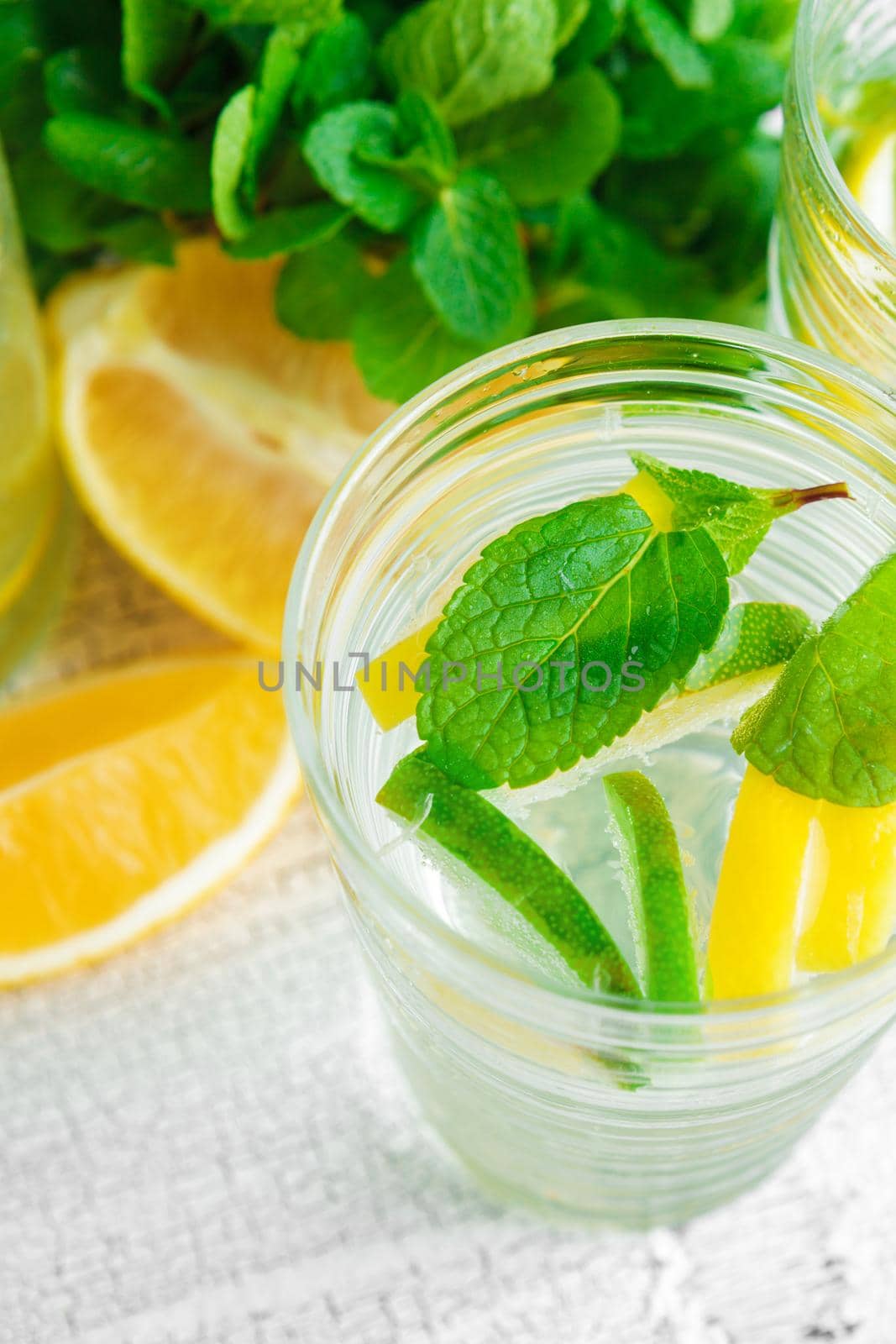 Summer drink. Traditional lemonade with lemon mint. Close up.