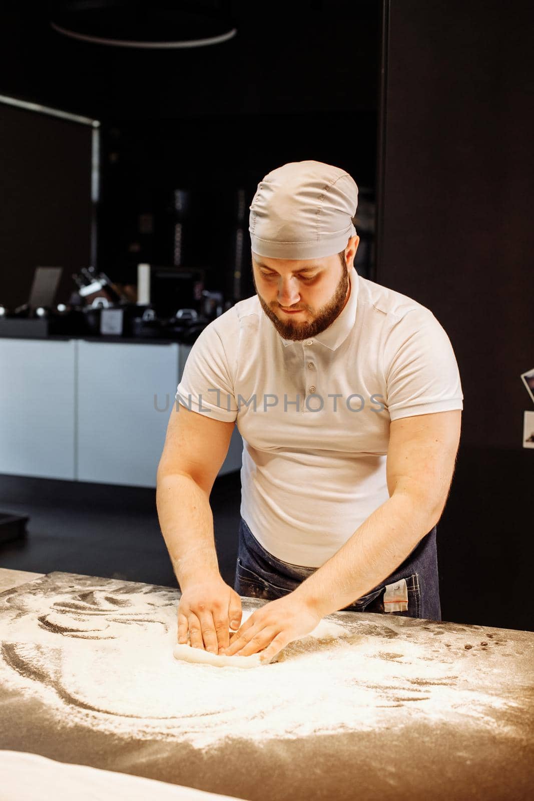 Making dough by hands at bakery or at home.