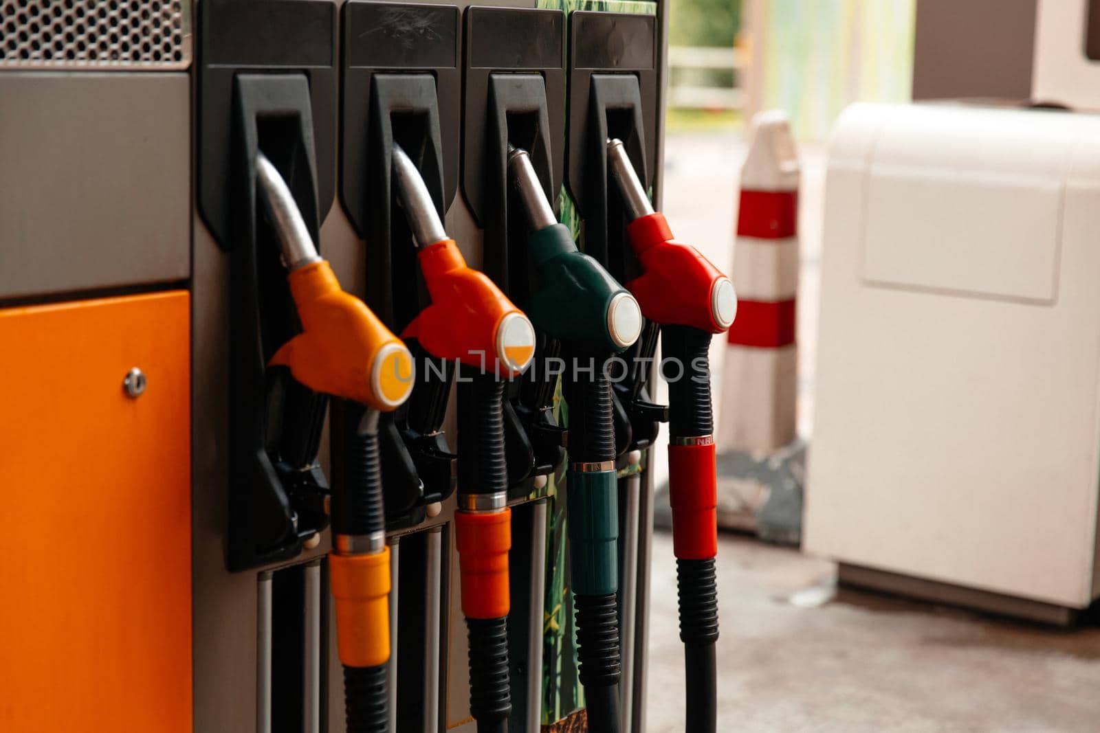 Fuel dispensing pump,Horizontal shot of some fuel pumps at a gas station. by RecCameraStock